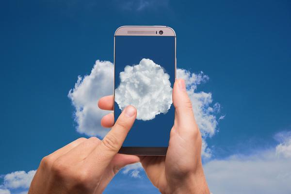 a mobile with a photo of a cloud