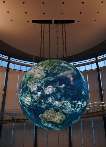 a photo showing the globe broken up into grids and wires